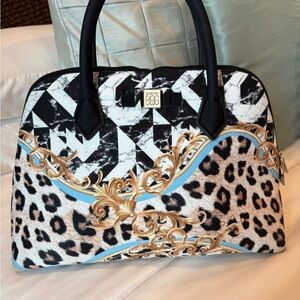 Elegant Black and Gold Patterned Satchel